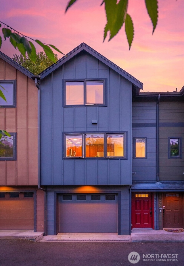 5955 Delridge Way SW, Seattle, WA 98106 - view of front of home featuring a garage and board and batten siding
