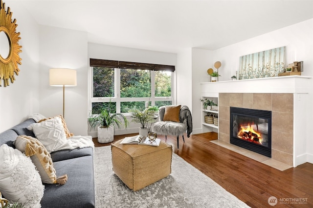 5955 Delridge Way SW, Seattle, WA 98106 - living area featuring a tiled fireplace and wood finished floors