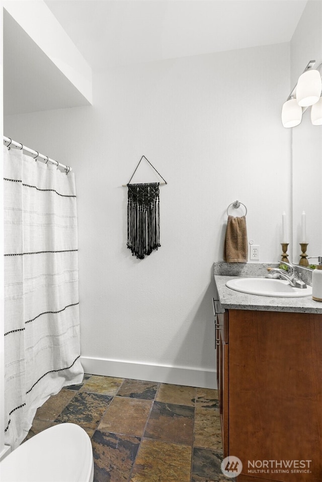 5955 Delridge Way SW, Seattle, WA 98106 - full bathroom with vanity, a shower with curtain, and stone finish floors