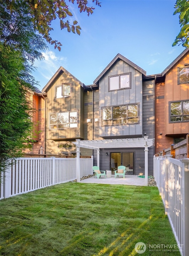 5955 Delridge Way SW, Seattle, WA 98106 - rear view of property featuring a fenced backyard, a patio area, and board and batten siding