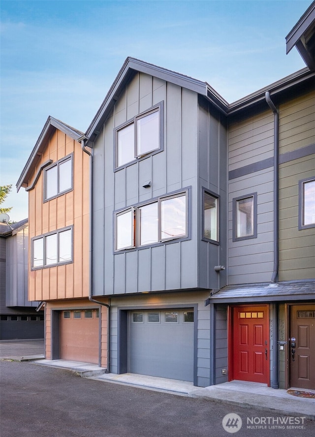 5955 Delridge Way SW, Seattle, WA 98106 - view of front of home featuring an attached garage and board and batten siding