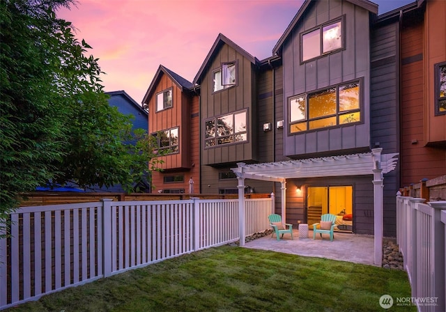 5955 Delridge Way SW, Seattle, WA 98106 - back of house with board and batten siding, a patio, a pergola, and a fenced backyard