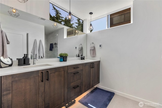 3418 23rd Ave W, Seattle, WA 98199 - full bath with double vanity and baseboards