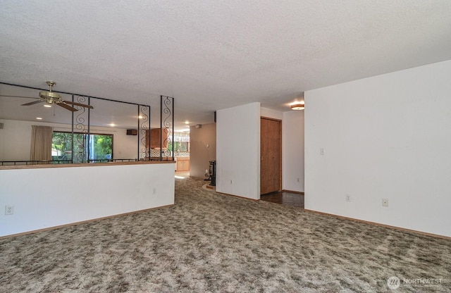1203 Contra Costa Ave, Fircrest, WA 98466 - unfurnished living room with carpet, ceiling fan, and a textured ceiling