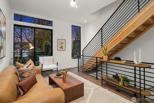 2236 Fairview Ave E Unit B, Seattle, WA 98102 - living area featuring wood finished floors, recessed lighting, and stairway