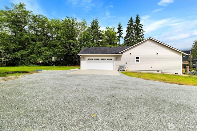 281 Shallow Shore Rd, Bellingham, WA 98229 - view of side of home with driveway, a garage, a lawn, and crawl space