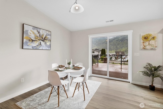 281 Shallow Shore Rd, Bellingham, WA 98229 - dining area featuring light wood-style floors and lofted ceiling