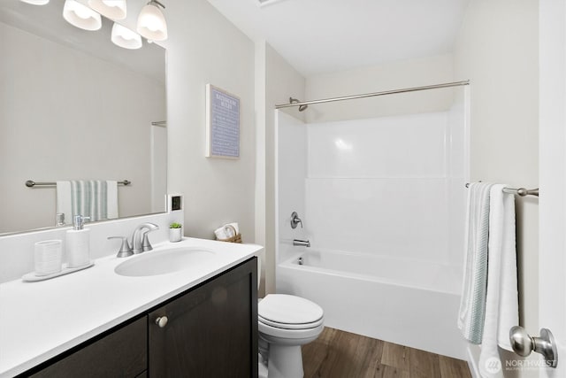 281 Shallow Shore Rd, Bellingham, WA 98229 - bathroom with vanity, wood finished floors, and shower / bathtub combination
