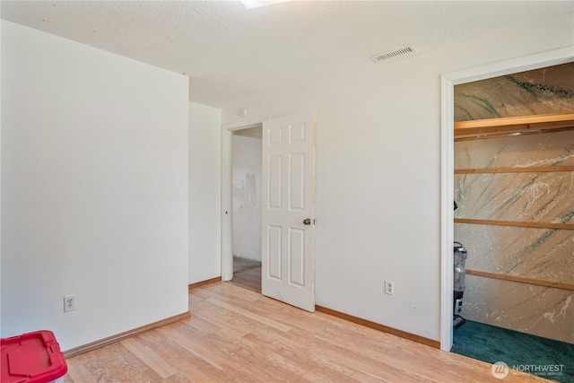 642 SW 5th Ave, Castle Rock, WA 98611 - unfurnished bedroom with wood finished floors and baseboards