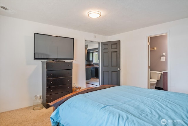 642 SW 5th Ave, Castle Rock, WA 98611 - bedroom with ensuite bathroom and carpet floors