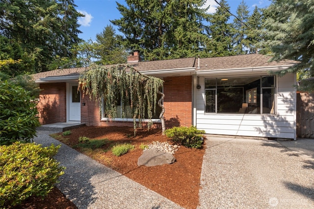 13523 23rd Pl NE, Seattle, WA 98125 - view of front of property featuring brick siding and a chimney