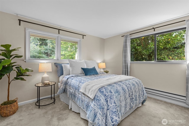 13523 23rd Pl NE, Seattle, WA 98125 - carpeted bedroom with a baseboard radiator and baseboards