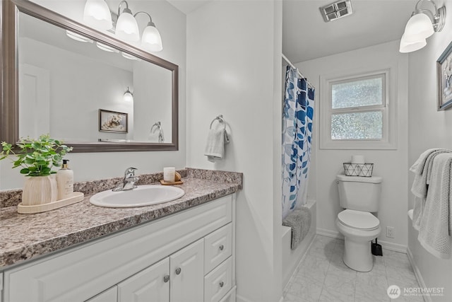 13523 23rd Pl NE, Seattle, WA 98125 - bathroom featuring vanity, marble look tiles, and shower / tub combo with curtain