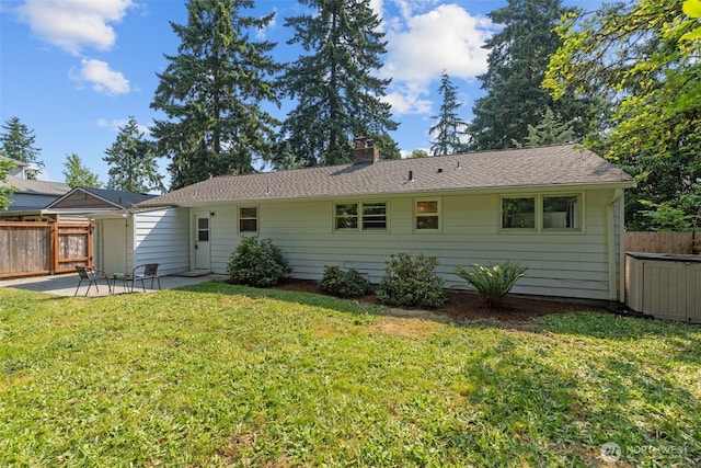 13523 23rd Pl NE, Seattle, WA 98125 - back of property featuring a patio area and a chimney