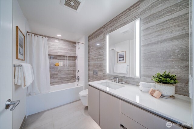 2510 6th Ave Unit 1204, Seattle, WA 98121 - bathroom featuring tile patterned floors, vanity, and shower / tub combo