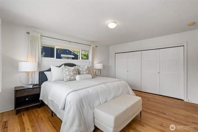4815 N Huson St, Tacoma, WA 98407 - bedroom featuring wood finished floors and a closet