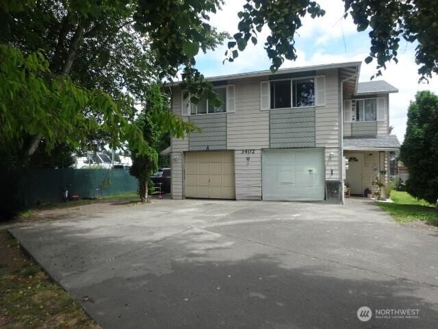 3402 C Ct SE, Auburn, WA 98002 - view of front of property with a garage and concrete driveway