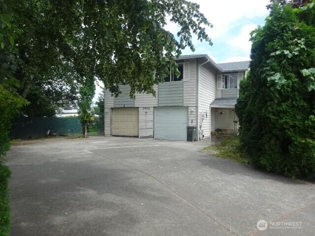 3402 C Ct SE, Auburn, WA 98002 - view of side of property with a garage and driveway