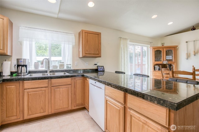 117 Bufflehead St SW, Ocean Shores, WA 98569 - kitchen featuring white dishwasher, a peninsula, plenty of natural light, recessed lighting, and tile countertops