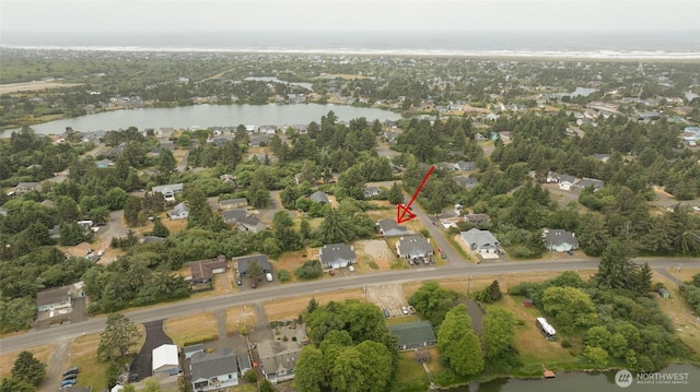 117 Bufflehead St SW, Ocean Shores, WA 98569 - aerial overview of property's location featuring a large body of water and nearby suburban area