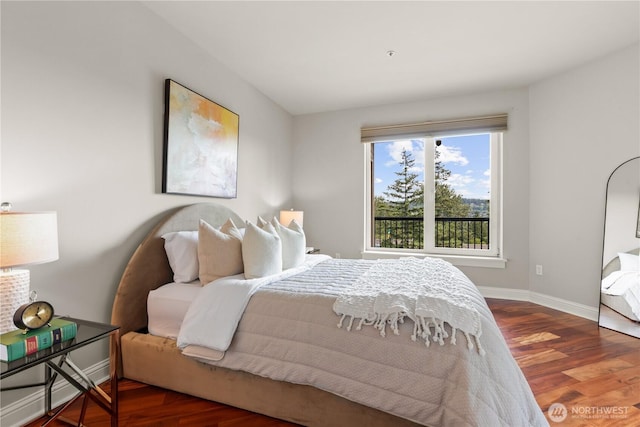 18707 SE Newport Way Unit 208, Issaquah, WA 98027 - bedroom featuring wood finished floors