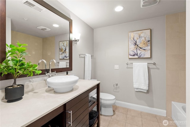 18707 SE Newport Way Unit 208, Issaquah, WA 98027 - full bathroom with vanity, tile patterned floors, and recessed lighting