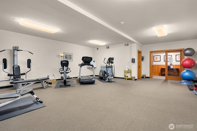 18707 SE Newport Way Unit 208, Issaquah, WA 98027 - exercise room featuring carpet and baseboards