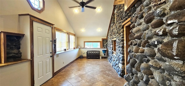 20354 Adrian Rd NE, Soap Lake, WA 98851 - foyer entrance with a ceiling fan, a fireplace, and high vaulted ceiling