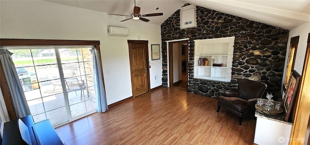 20354 Adrian Rd NE, Soap Lake, WA 98851 - living area featuring an AC wall unit, wood finished floors, a ceiling fan, and high vaulted ceiling