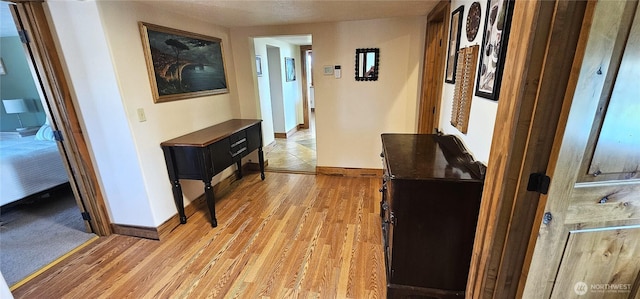 20354 Adrian Rd NE, Soap Lake, WA 98851 - hallway featuring light wood-style floors and baseboards
