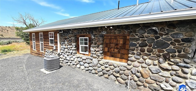 20354 Adrian Rd NE, Soap Lake, WA 98851 - view of side of property featuring stone siding and a metal roof