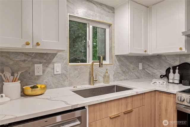 15409 Westshore Dr SE, Yelm, WA 98597 - kitchen featuring dishwasher, white cabinetry, and tasteful backsplash