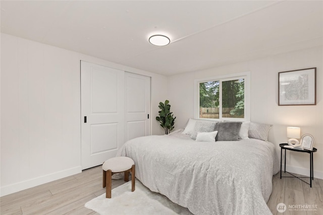 15409 Westshore Dr SE, Yelm, WA 98597 - bedroom with light wood-style flooring and a closet