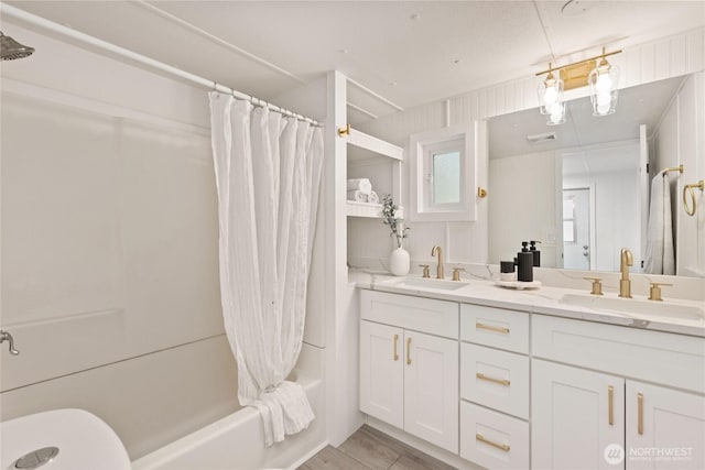 15409 Westshore Dr SE, Yelm, WA 98597 - bathroom featuring shower / tub combo with curtain and double vanity