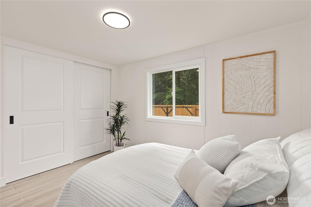 15409 Westshore Dr SE, Yelm, WA 98597 - bedroom featuring light wood-style flooring and a closet