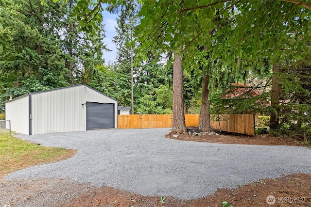 15409 Westshore Dr SE, Yelm, WA 98597 - detached garage featuring gravel driveway