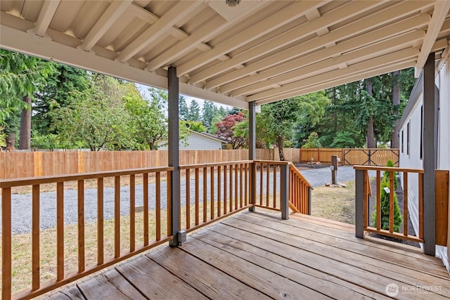 15409 Westshore Dr SE, Yelm, WA 98597 - wooden terrace with a fenced backyard and a water view
