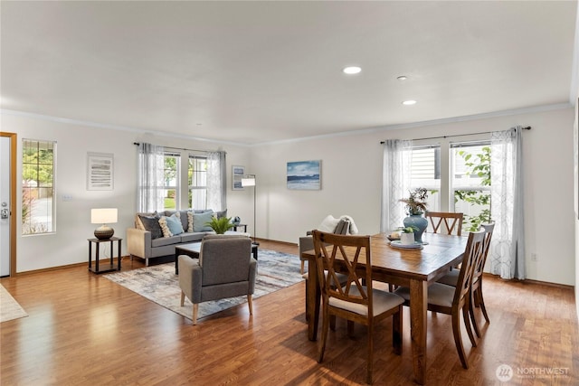 1662 Jensen Ave, Dupont, WA 98327 - dining space featuring crown molding, light wood-style floors, and recessed lighting