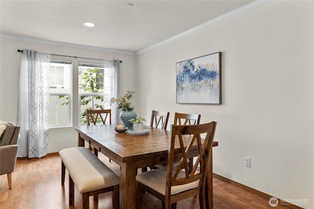 1662 Jensen Ave, Dupont, WA 98327 - dining space with ornamental molding and light wood-style flooring