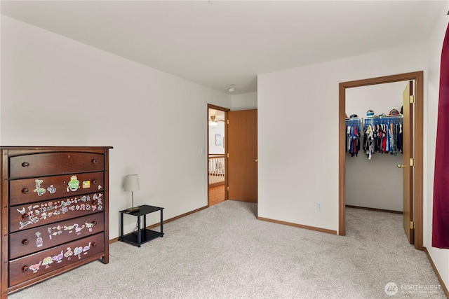 1662 Jensen Ave, Dupont, WA 98327 - bedroom with carpet floors and a walk in closet