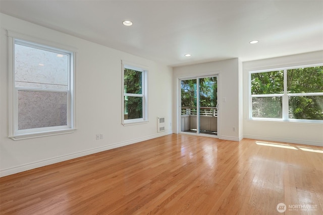1426A NW 59th St, Seattle, WA 98107 - empty room featuring light wood-style flooring and recessed lighting