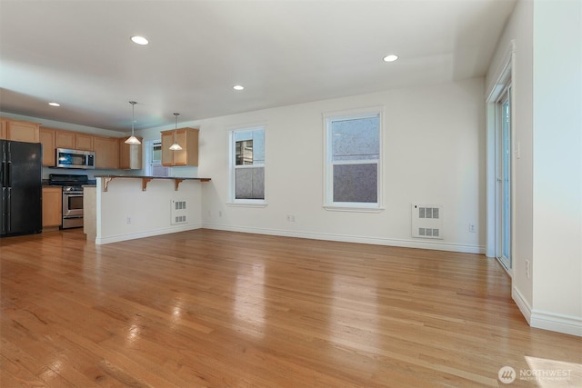 1426A NW 59th St, Seattle, WA 98107 - unfurnished living room with light wood-type flooring and recessed lighting