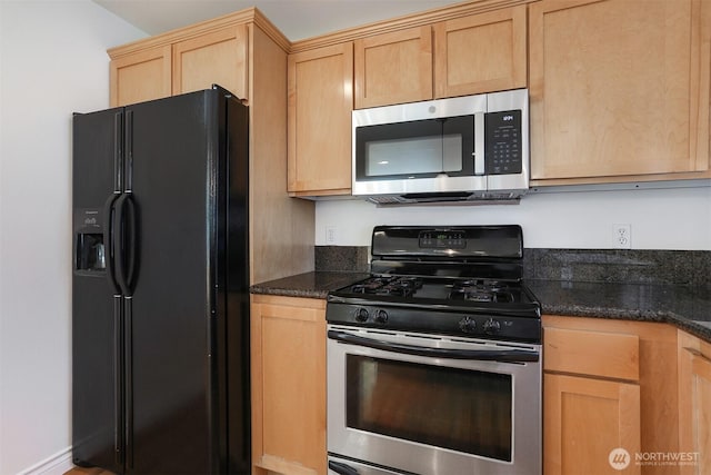 1426A NW 59th St, Seattle, WA 98107 - kitchen featuring appliances with stainless steel finishes, light brown cabinetry, and dark stone countertops