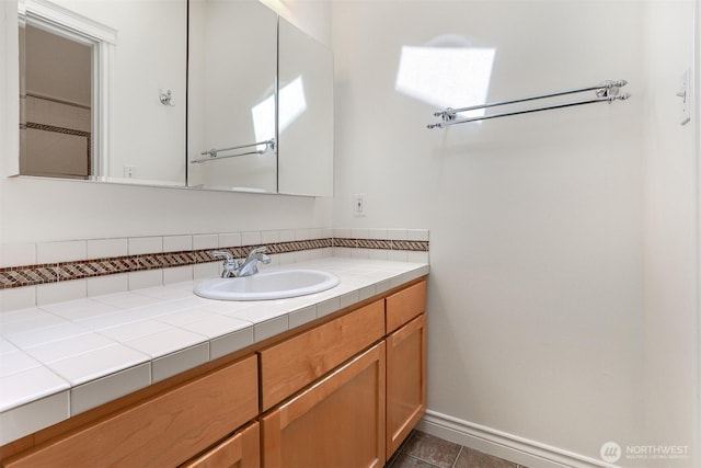 1426A NW 59th St, Seattle, WA 98107 - bathroom featuring vanity, tasteful backsplash, and tile patterned floors