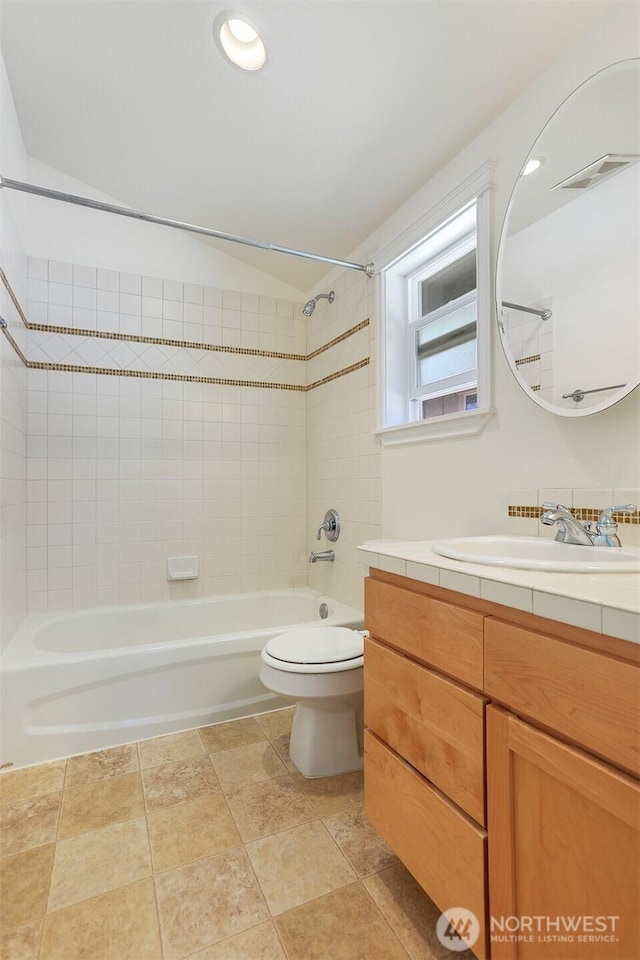 1426A NW 59th St, Seattle, WA 98107 - full bathroom with washtub / shower combination, vaulted ceiling, vanity, and recessed lighting