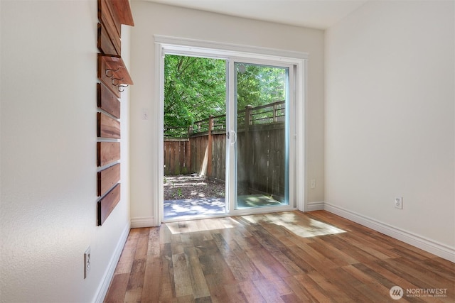 1426A NW 59th St, Seattle, WA 98107 - doorway with wood finished floors and baseboards