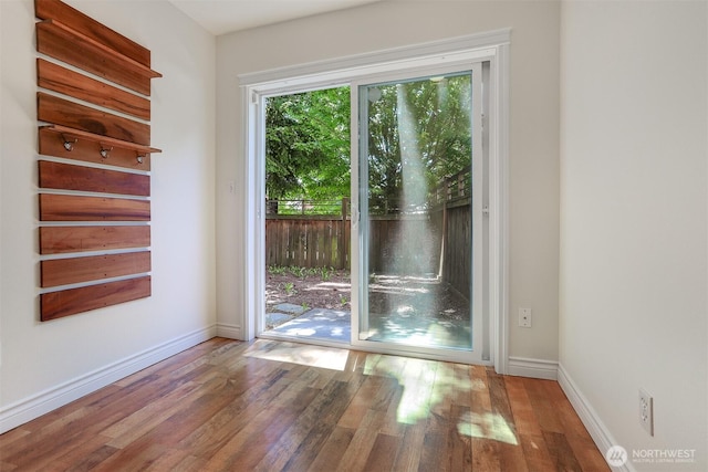 1426A NW 59th St, Seattle, WA 98107 - spare room with wood finished floors and baseboards