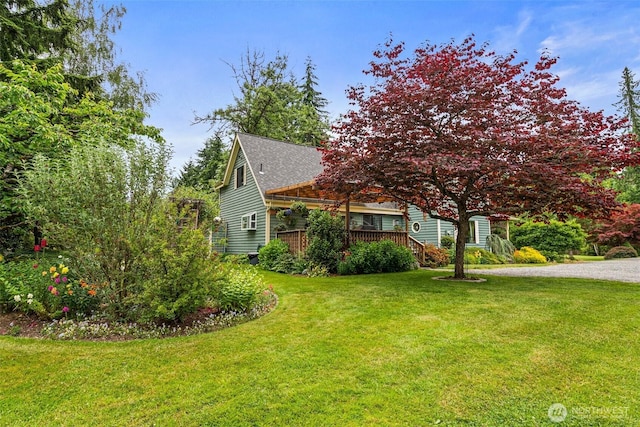 15526 SE 344th St, Auburn, WA 98092 - view of front of home featuring a deck, a front lawn, and a shingled roof