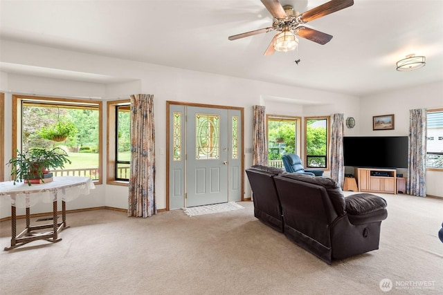 15526 SE 344th St, Auburn, WA 98092 - living room with light colored carpet, plenty of natural light, and ceiling fan