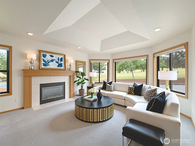 412 Doe Run Rd, Sequim, WA 98382 - living room featuring plenty of natural light, carpet, recessed lighting, a tiled fireplace, and a raised ceiling